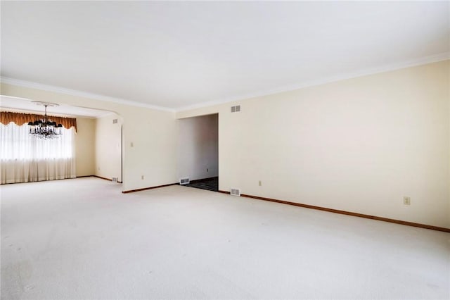 3215 Concord St, Neshannock Twp, PA 16105 - spare room with a chandelier, crown molding, light carpet, and arched walkways