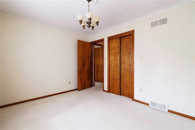 3215 Concord St, Neshannock Twp, PA 16105 - unfurnished bedroom featuring a chandelier, light colored carpet, crown molding, and a closet