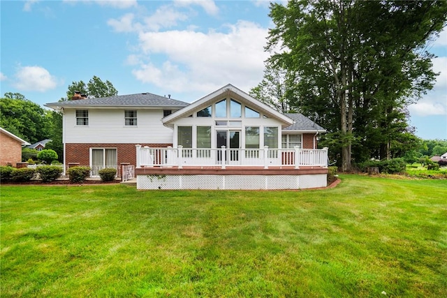 3215 Concord St, Neshannock Twp, PA 16105 - rear view of house with a wooden deck, brick siding, a yard, and a sunroom