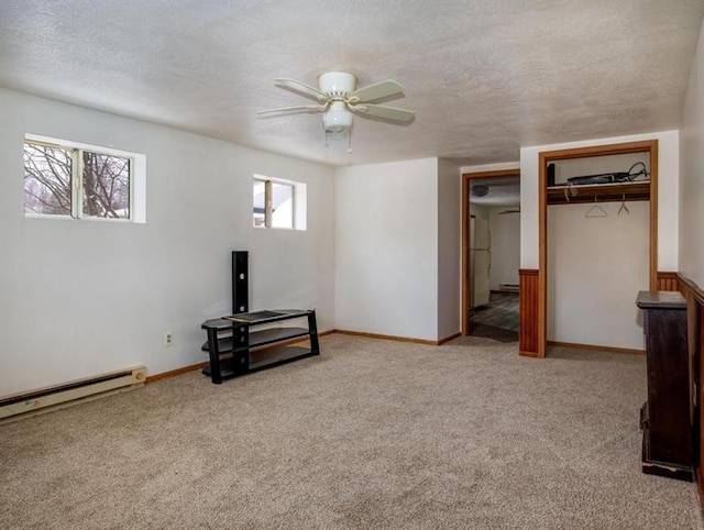 3105 Bennetts Run Rd, North Sewickley Twp, PA 15010 - unfurnished bedroom with carpet flooring, a baseboard heating unit, a closet, a textured ceiling, and a ceiling fan