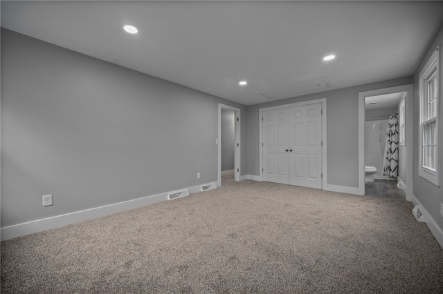 240 Wallingford Dr, Ross Twp, PA 15237 - unfurnished bedroom with carpet flooring, recessed lighting, a closet, connected bathroom, and attic access