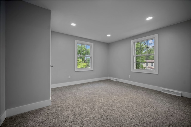 240 Wallingford Dr, Ross Twp, PA 15237 - carpeted empty room with recessed lighting