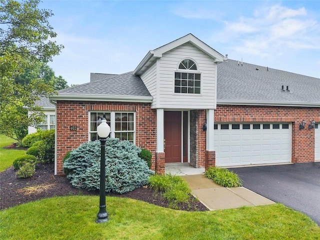 402 Providence Ct, Adams Twp, PA 16059 - traditional-style home featuring brick siding, a shingled roof, an attached garage, and asphalt driveway