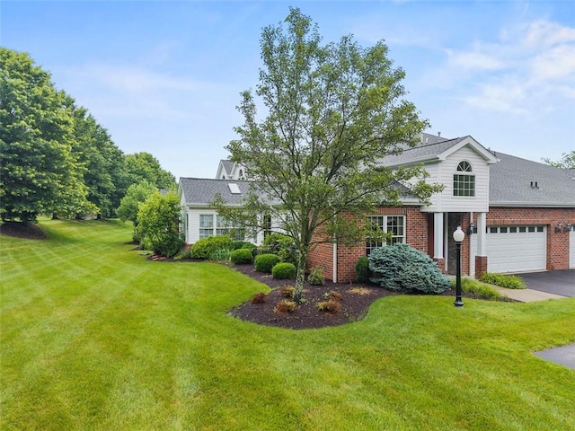 402 Providence Ct, Adams Twp, PA 16059 - view of front of home with brick siding, a front yard, driveway, and an attached garage