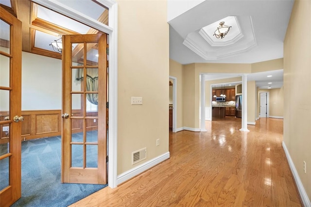402 Providence Ct, Adams Twp, PA 16059 - corridor featuring decorative columns and wood finished floors
