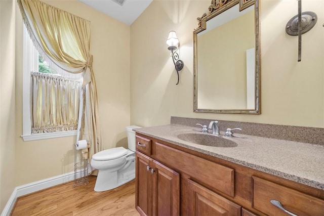 402 Providence Ct, Adams Twp, PA 16059 - half bath featuring wood finished floors and vanity