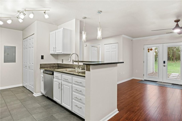 3011 Lenox Oval, Ross Twp, PA 15237 - kitchen with dishwasher, electric panel, dark countertops, white cabinetry, and hanging light fixtures