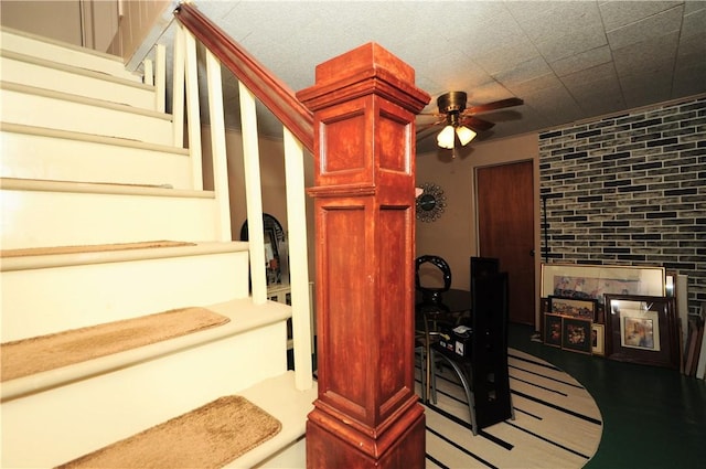 2 Mccormick Ave, Uniontown, PA 15401 - stairs featuring a ceiling fan and a fireplace