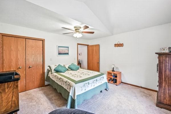 3129 Saranac Dr, South Pymatuning Twp, PA 16150 - bedroom with light carpet, a closet, and a ceiling fan