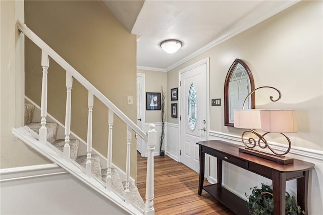 108 Colonial Dr, Leet Twp, PA 15143 - entrance foyer featuring wood finished floors, stairway, and ornamental molding