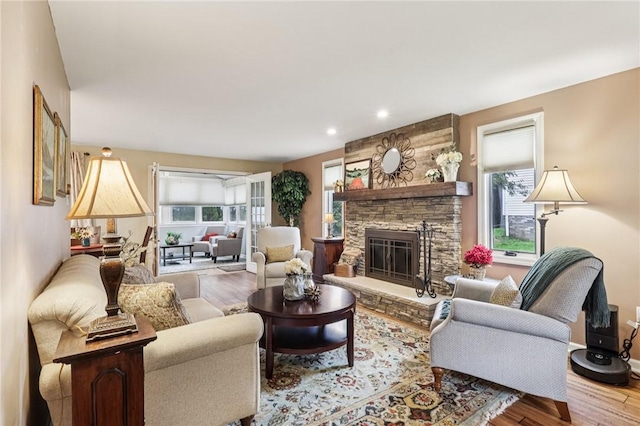 108 Colonial Dr, Leet Twp, PA 15143 - living room with wood finished floors, a fireplace, and recessed lighting