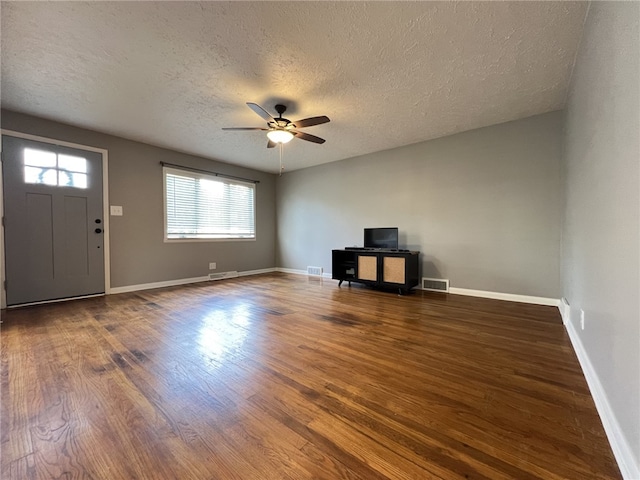 43 Barton Mill Rd, South Union Twp, PA 15401 - unfurnished living room featuring a textured ceiling, a ceiling fan, and wood finished floors