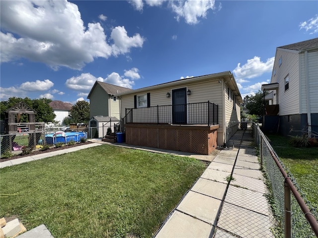 43 Barton Mill Rd, South Union Twp, PA 15401 - rear view of house featuring a fenced backyard and a wooden deck