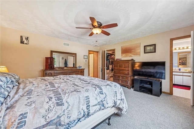 915 Jamell Dr, Unity Twp, PA 15601 - carpeted bedroom featuring ceiling fan, a spacious closet, a closet, and ensuite bathroom