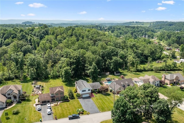 915 Jamell Dr, Unity Twp, PA 15601 - aerial view of residential area with a heavily wooded area