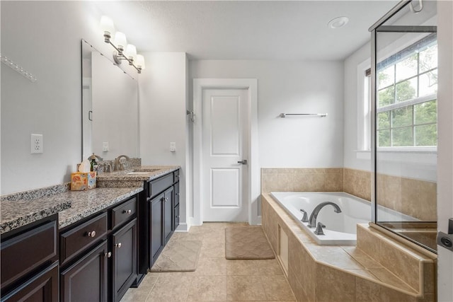 1761 Stevensan Dr, Franklin Park, PA 15143 - bathroom with vanity, a garden tub, and tile patterned flooring