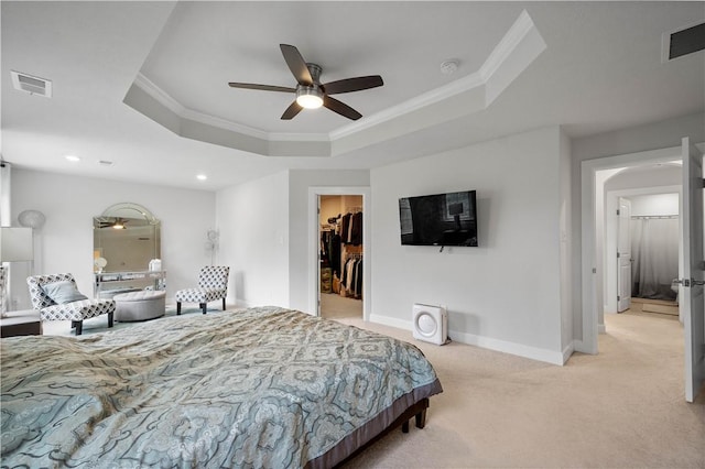1761 Stevensan Dr, Franklin Park, PA 15143 - bedroom featuring crown molding, a raised ceiling, light colored carpet, a walk in closet, and ceiling fan