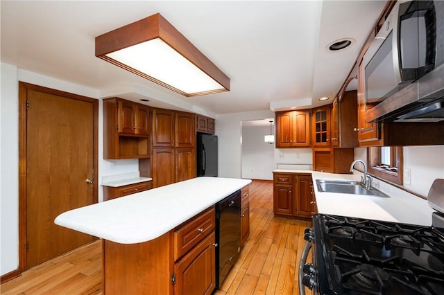 131 Windgate Dr, Marshall, PA 15090 - kitchen with stainless steel microwave, gas range, fridge, light countertops, and light wood finished floors