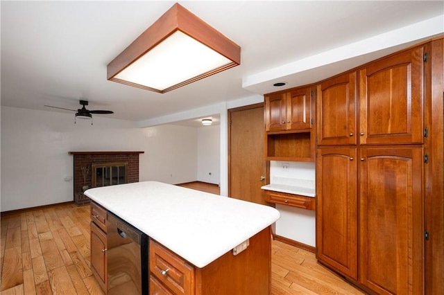 131 Windgate Dr, Marshall, PA 15090 - kitchen featuring black dishwasher, light wood-type flooring, brown cabinets, and light countertops