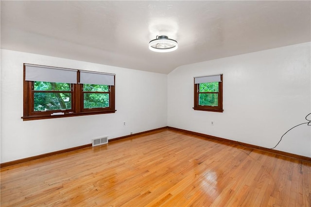 131 Windgate Dr, Marshall, PA 15090 - empty room featuring healthy amount of natural light, light wood-style flooring, and vaulted ceiling