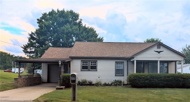 373 Pittsburgh St, Derry Twp, PA 15671 - view of front of property with driveway, a front yard, a shingled roof, and an attached carport