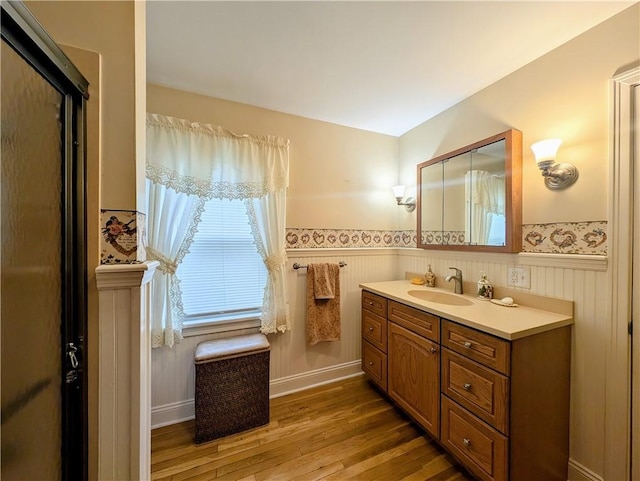 373 Pittsburgh St, Derry Twp, PA 15671 - bathroom featuring a wainscoted wall, vanity, and wood finished floors