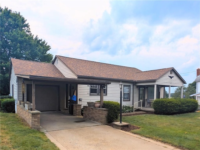 373 Pittsburgh St, Derry Twp, PA 15671 - ranch-style home with a front lawn, a shingled roof, concrete driveway, and a garage