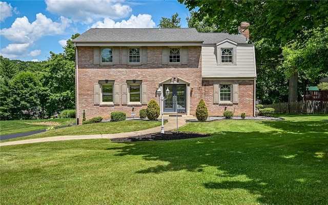 2276 Rochester Rd, Franklin Park, PA 15237 - view of front of property with french doors, a chimney, a front lawn, and brick siding