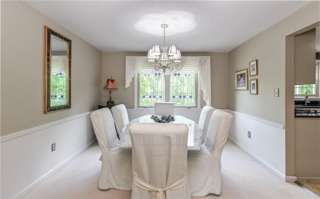 2276 Rochester Rd, Franklin Park, PA 15237 - dining area featuring a chandelier, plenty of natural light, and light carpet