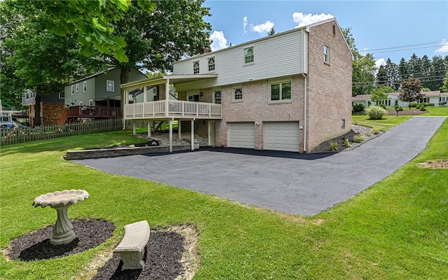 2276 Rochester Rd, Franklin Park, PA 15237 - back of house with asphalt driveway, a garage, and a chimney