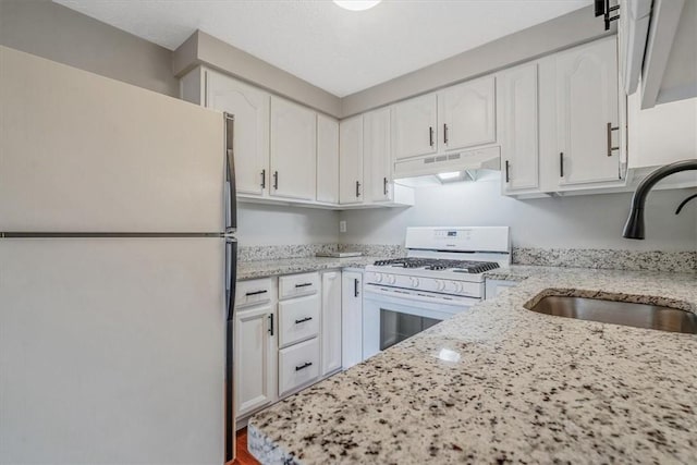226 Glen Spring Cir, North Strabane, PA 15317 - kitchen featuring white appliances, under cabinet range hood, white cabinets, light stone counters, and wood finished floors