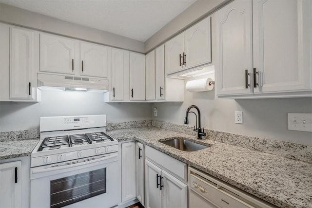 226 Glen Spring Cir, North Strabane, PA 15317 - kitchen with white appliances, under cabinet range hood, white cabinetry, and light stone countertops