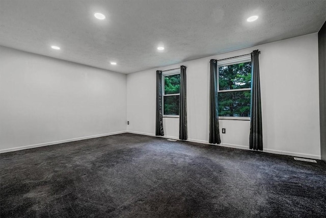226 Glen Spring Cir, North Strabane, PA 15317 - unfurnished room with recessed lighting, a textured ceiling, and dark colored carpet