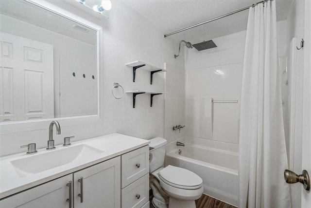 226 Glen Spring Cir, North Strabane, PA 15317 - bathroom with shower / tub combo with curtain, vanity, and a textured ceiling