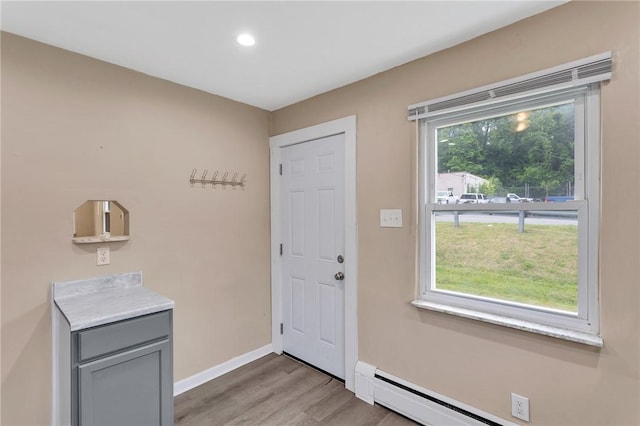 1048 Unity Center Rd, Plum Boro, PA 15239 - entrance foyer featuring light wood finished floors, recessed lighting, and a baseboard heating unit