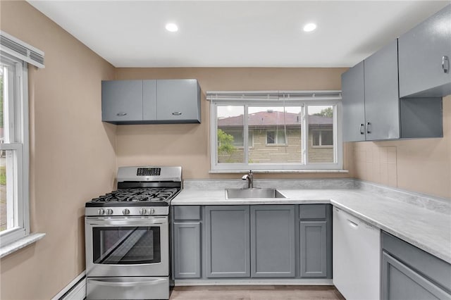 1048 Unity Center Rd, Plum Boro, PA 15239 - kitchen with stainless steel gas range, gray cabinetry, dishwasher, plenty of natural light, and recessed lighting