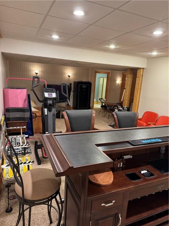 91 Celtic Ash Ct, Cranberry Twp, PA 16066 - carpeted dining space with wood walls, a paneled ceiling, and recessed lighting