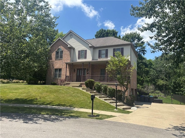 91 Celtic Ash Ct, Cranberry Twp, PA 16066 - view of front facade with a porch and brick siding