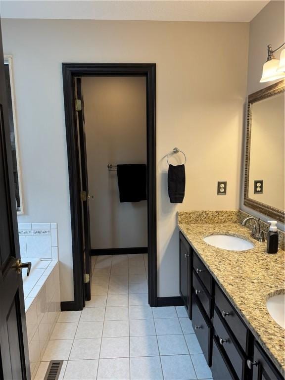91 Celtic Ash Ct, Cranberry Twp, PA 16066 - bathroom with double vanity, a bath, and tile patterned flooring