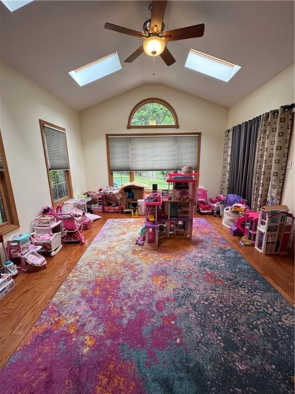 91 Celtic Ash Ct, Cranberry Twp, PA 16066 - rec room featuring a skylight, wood finished floors, vaulted ceiling, and ceiling fan