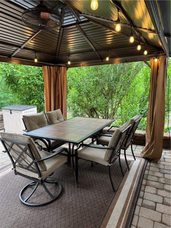 91 Celtic Ash Ct, Cranberry Twp, PA 16066 - view of patio with a gazebo, outdoor dining area, and a ceiling fan