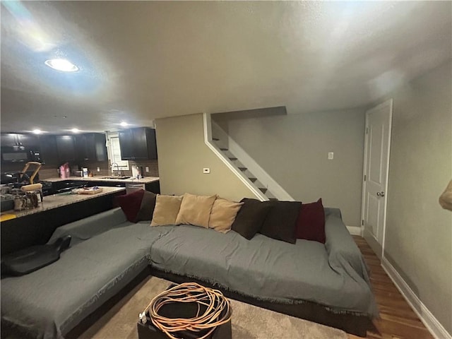 2814 Eccles St, South Side, PA 15210 - living area with wood finished floors, stairway, and recessed lighting