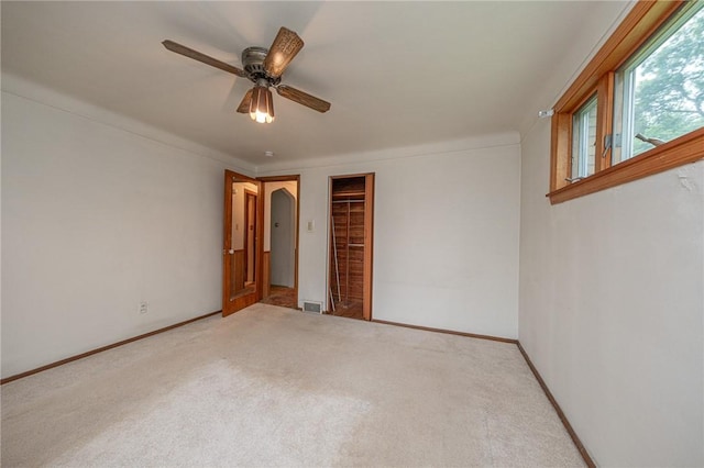 246 Maple Dr, Monroeville, PA 15146 - unfurnished bedroom with carpet, a closet, and a ceiling fan