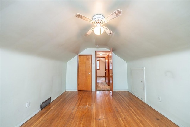 246 Maple Dr, Monroeville, PA 15146 - additional living space featuring light wood-style floors, a ceiling fan, and lofted ceiling