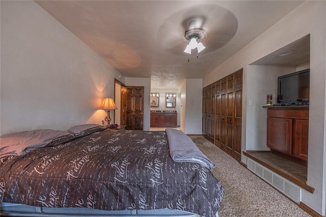 315 Pennsylvania Ave, Plum Boro, PA 15147 - carpeted bedroom featuring ensuite bathroom, a closet, and ceiling fan