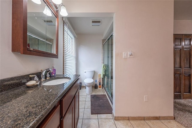 315 Pennsylvania Ave, Plum Boro, PA 15147 - bathroom with tile patterned flooring, vanity, and a stall shower