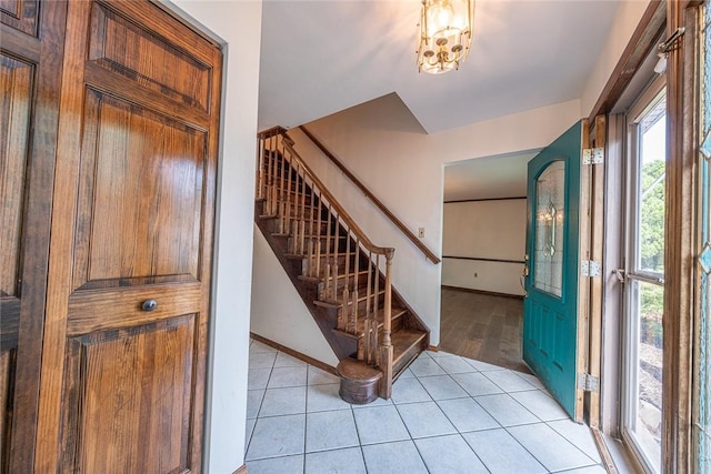 315 Pennsylvania Ave, Plum Boro, PA 15147 - entrance foyer featuring stairway and light tile patterned flooring