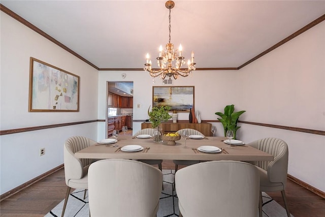 315 Pennsylvania Ave, Plum Boro, PA 15147 - dining area featuring a chandelier, wood finished floors, and crown molding