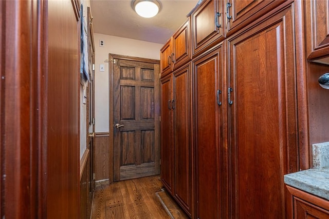 315 Pennsylvania Ave, Plum Boro, PA 15147 - doorway to outside with dark wood-type flooring and a wainscoted wall