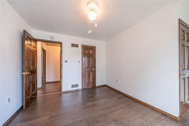 315 Pennsylvania Ave, Plum Boro, PA 15147 - unfurnished bedroom featuring dark wood finished floors and baseboards
